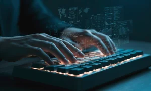 hacker-using-computer-keyboard-with-data-visualization